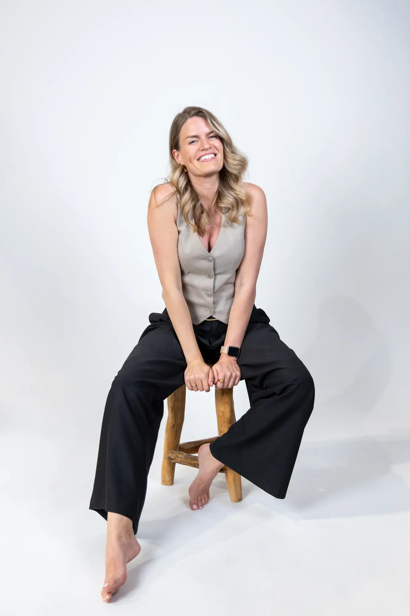 Fia Addicks, mindset and identity coach for entrepreneurs, sitting for a portrait